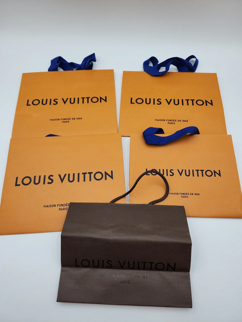 Lot of 5 authentic orange brown Louis Vuitton paper shopping gift medium